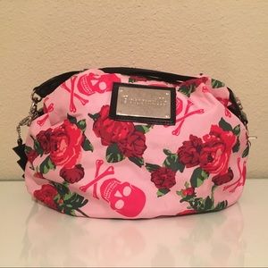 Pink Betseyville purse with skulls